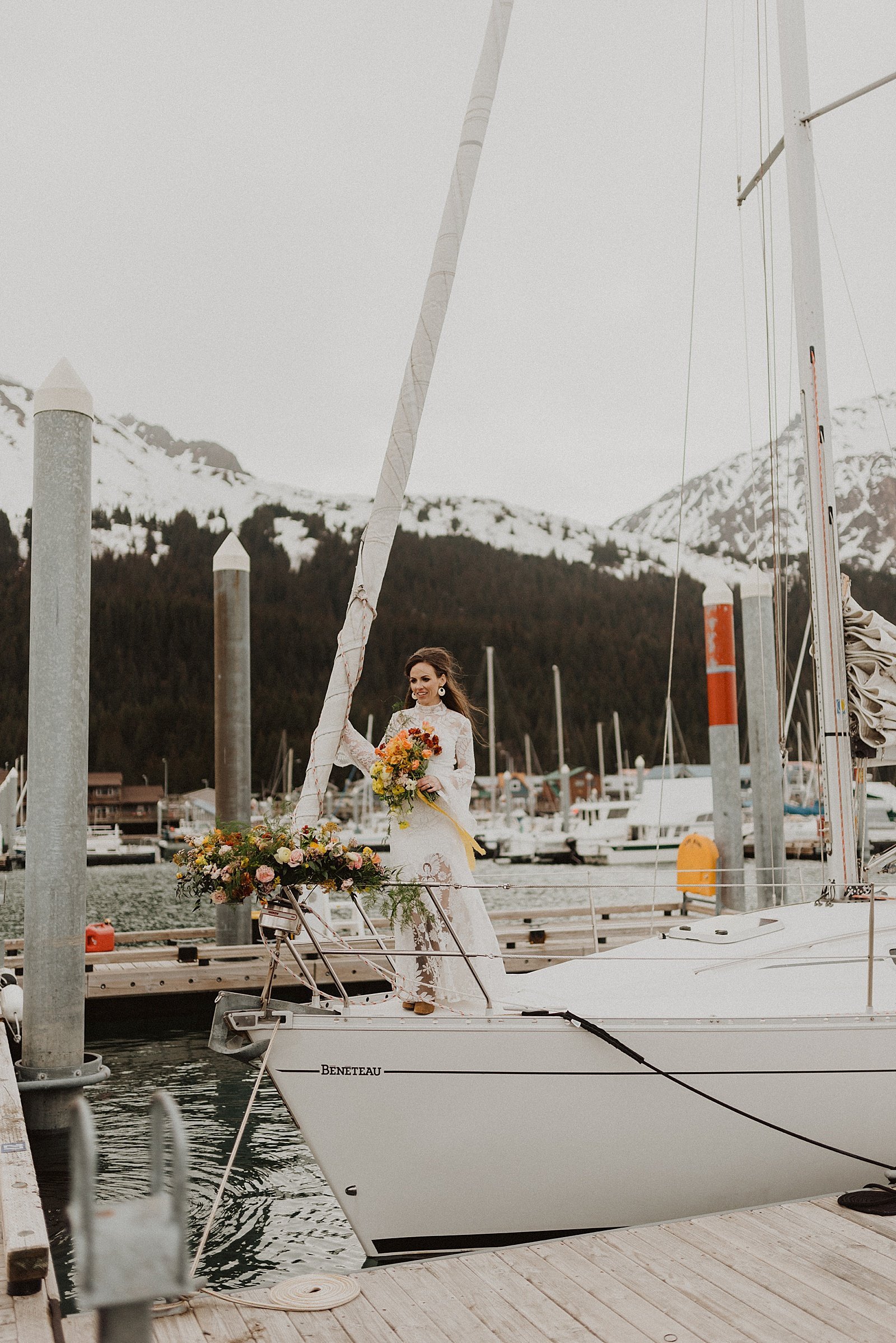  Bride standing on a boat for a Retro Seward Styled Shoot 
