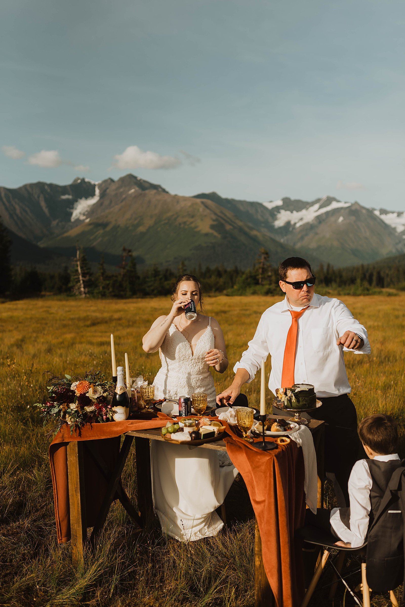  Bride and groom having champagne at Girdwood intimate family elopement 