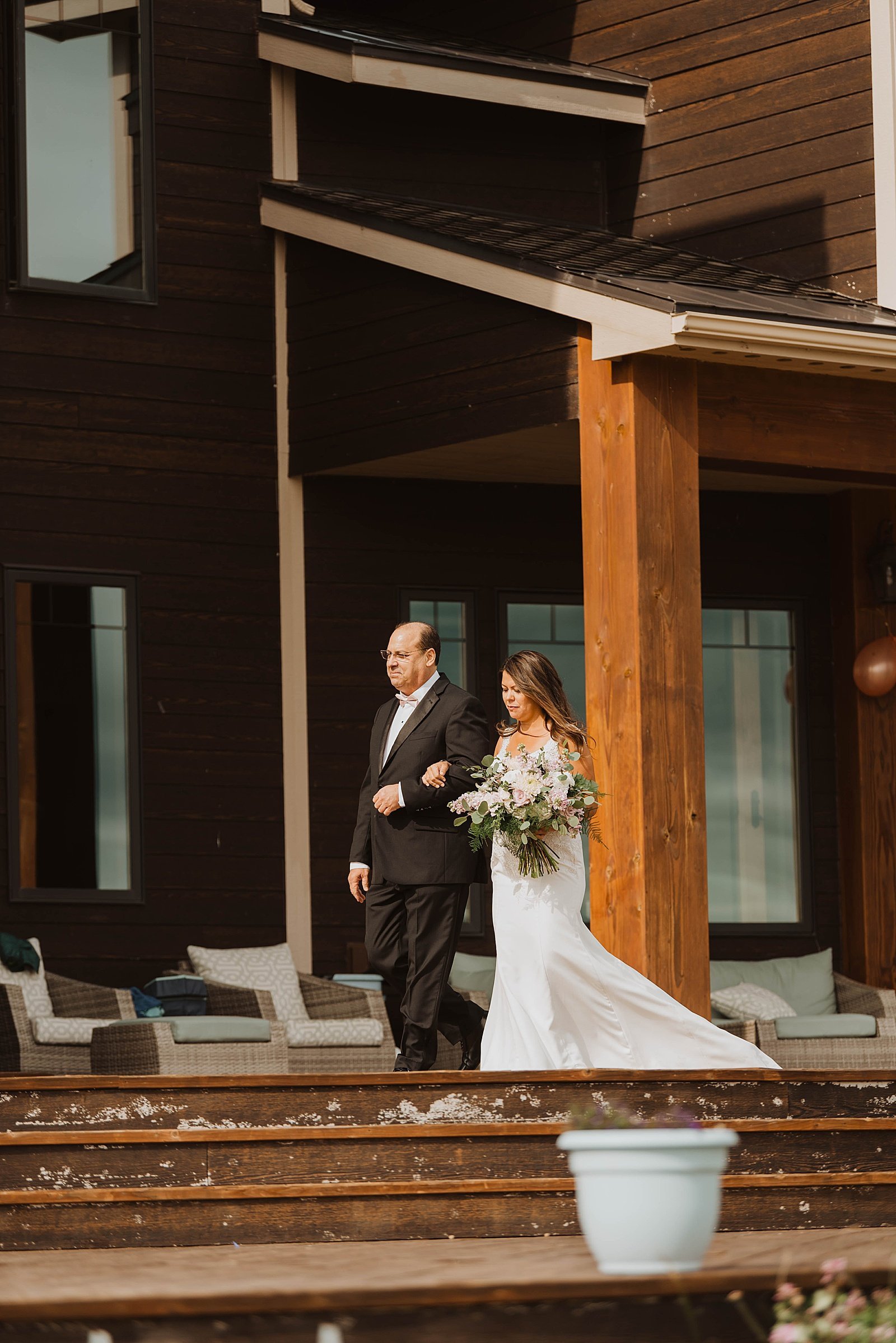  Bride approaching the ceremony at Second Star Mansion wedding venue 