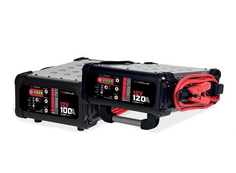 Two portable jump starter packs, one labeled 12V 100A and the other 12V 120A, with cables attached.