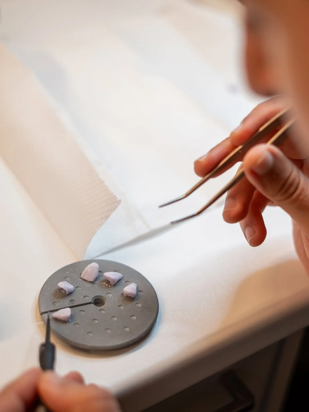Dr Mustafa Bassam preparing veneers