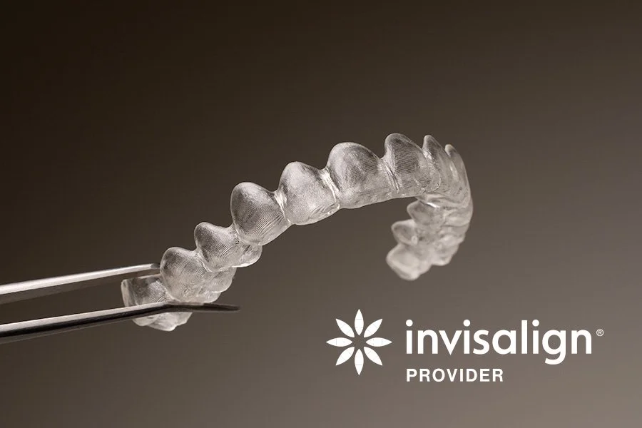 Invisalign held by a twizzer