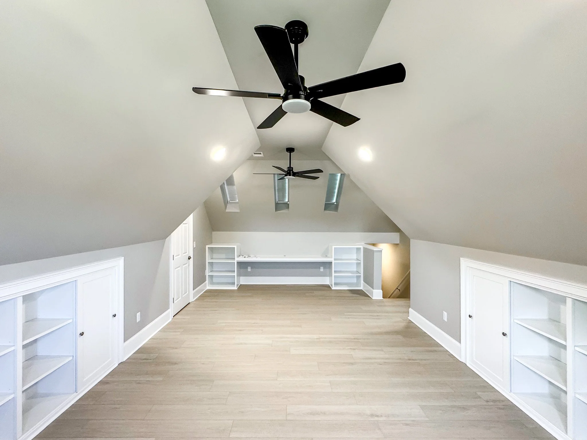 Finished Attic Build-Out Living Space with Built-Ins in Garner NC