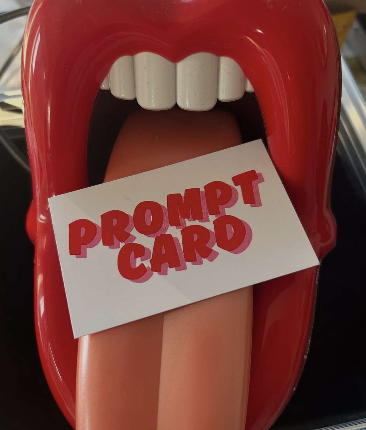 The big mouth phone from I Just Called To Say with a prompt card in it's mouth