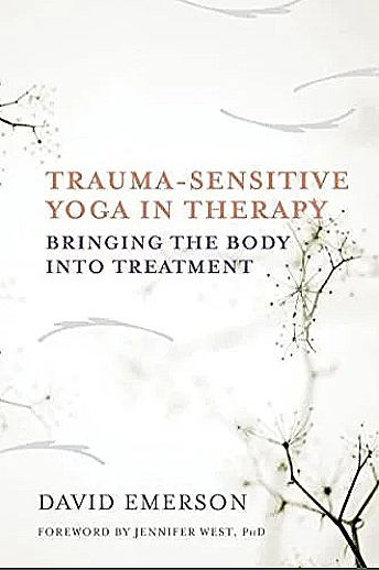 Book cover titled 'Trauma-Sensitive Yoga in Therapy: Bringing the Body into Treatment' by David Emerson, with a white background and minimalist dandelion illustrations.