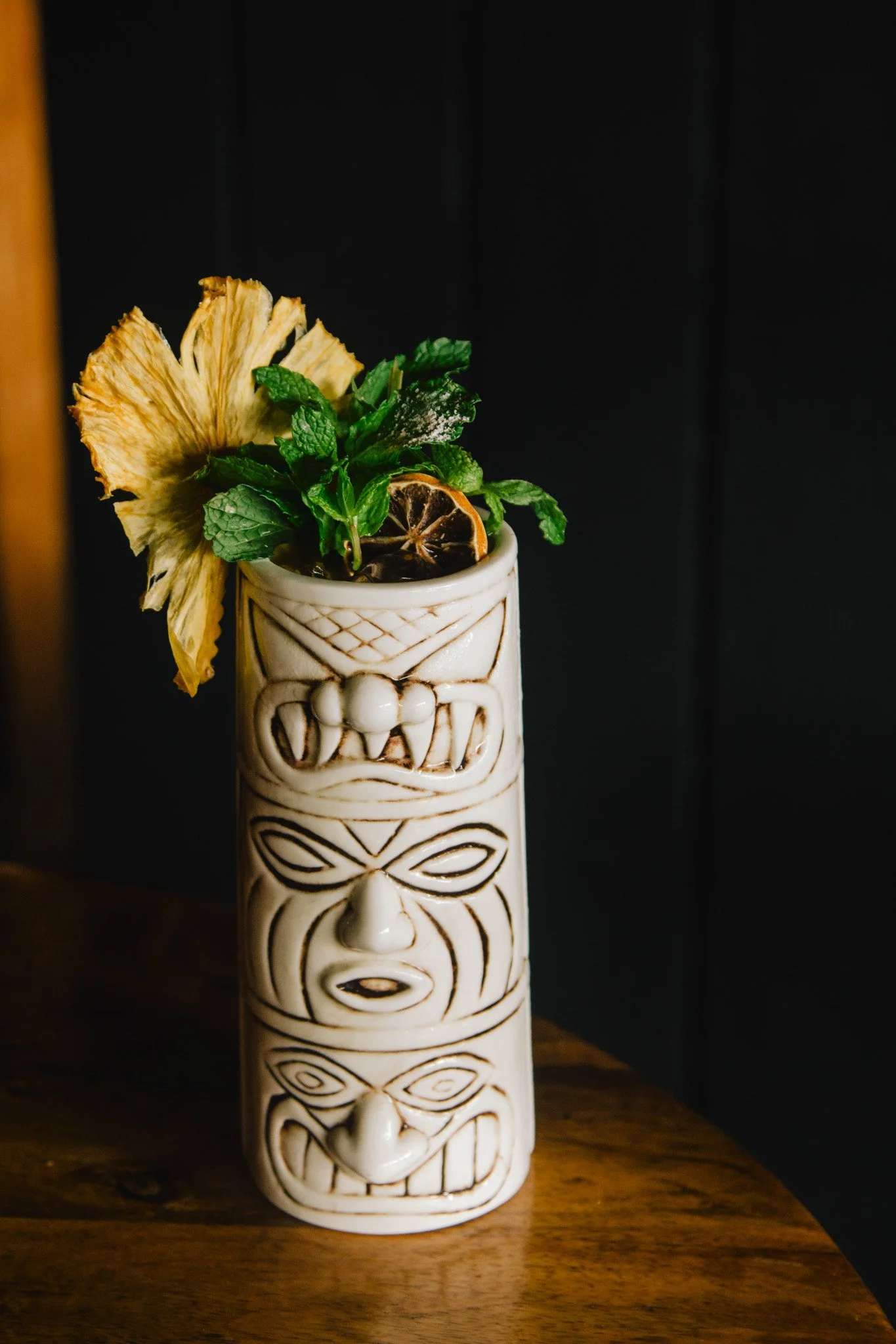 Signature pina colada tiki cocktail.