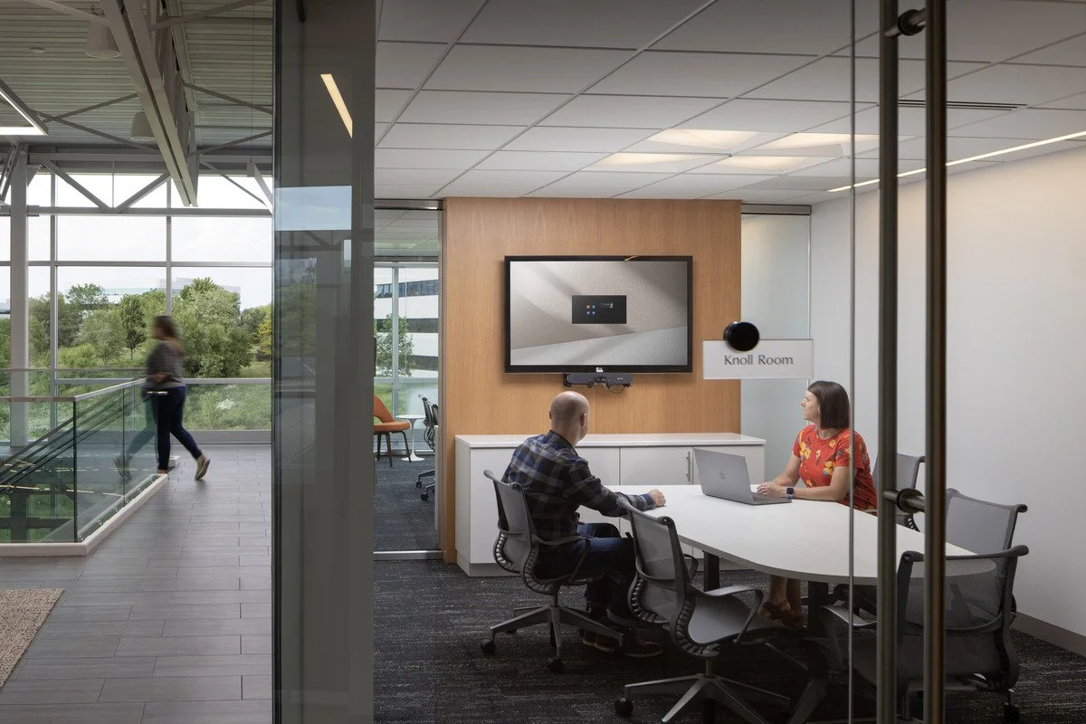 Lobby remodel by Pivotal featuring recessed ceiling lighting and troffer fixtures. 