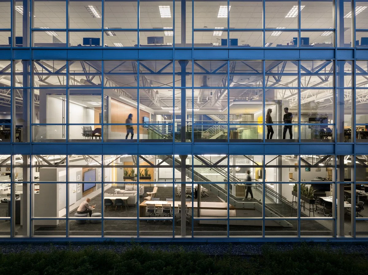 Lobby remodel by Pivotal, highlighting uplighting effects. 