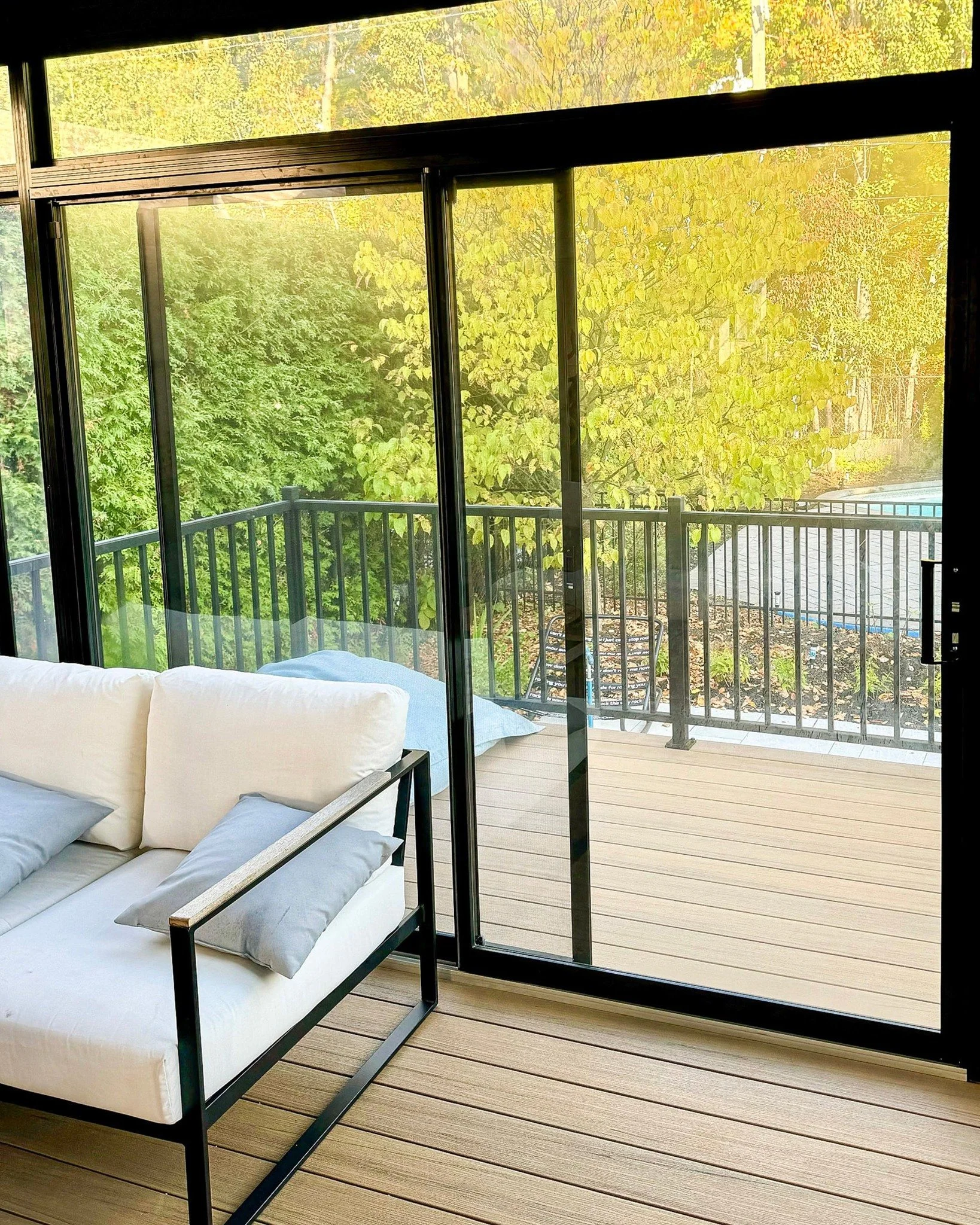 A sliding glass door setup designed to create a seamless transition between indoor comfort and outdoor space.

Large glass panels bring in natural light while maintaining a clean, functional layout.

Built in Laval.

#montrealhomes #westislandmontrea
