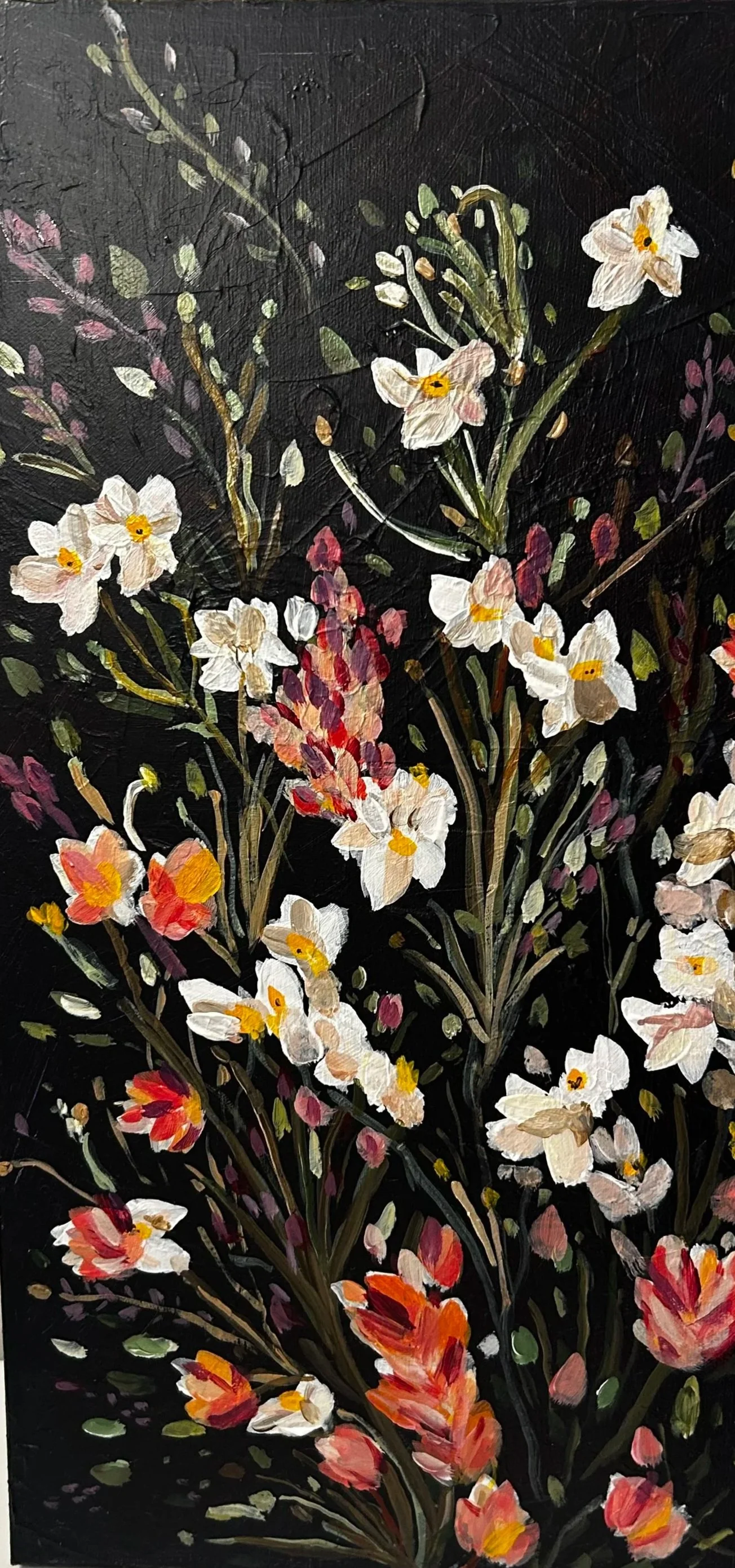 Oil painting of white, pink, and orange flowers with green stems on a black background.