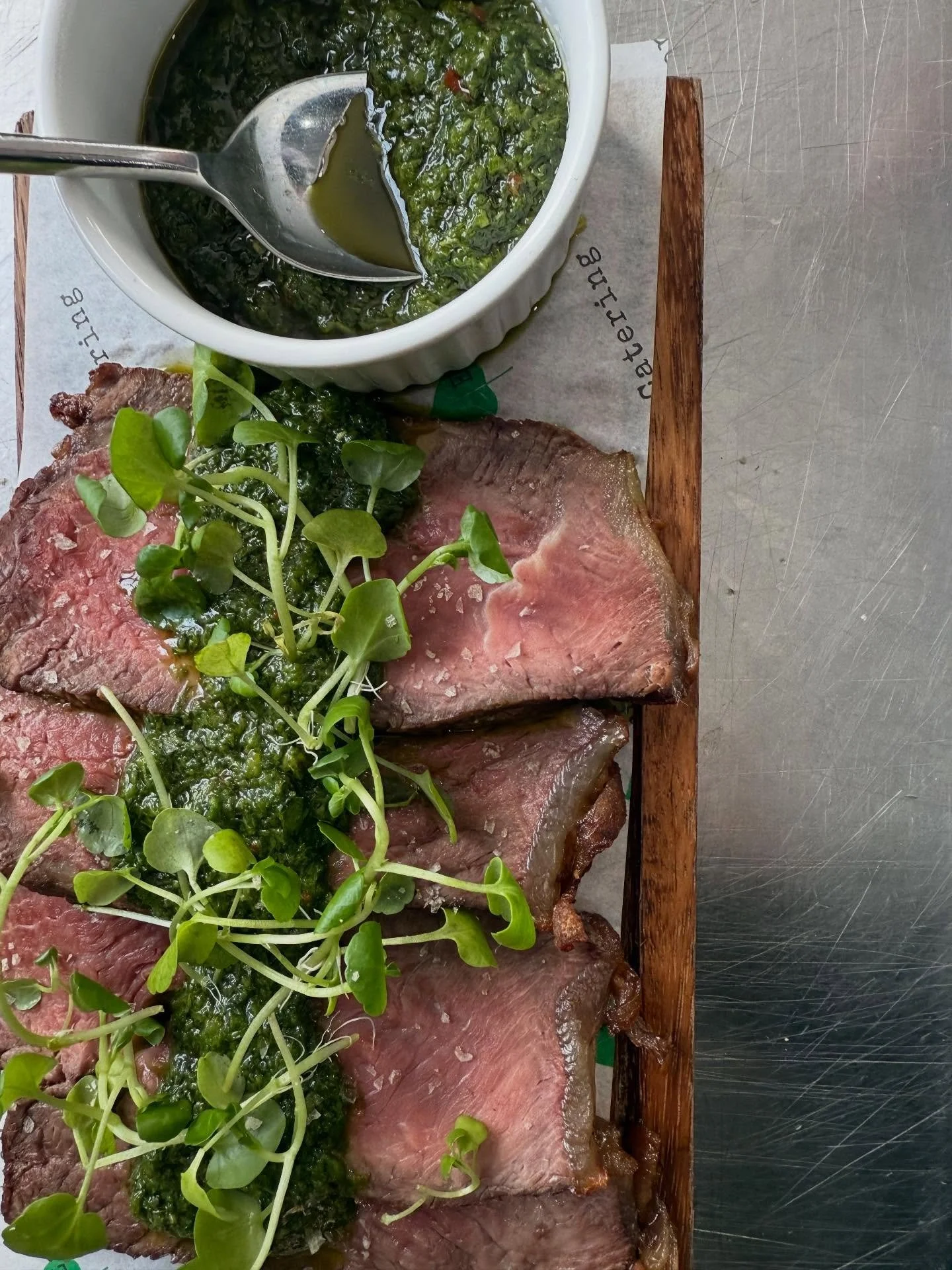 Feasting and sharing is such a huge part of our summer season of food and we love it! Sharing sirloin with chimichurri #sirloin #chimchurri #food #earthcatering #sharingfood #weddingbreakfast #caterer