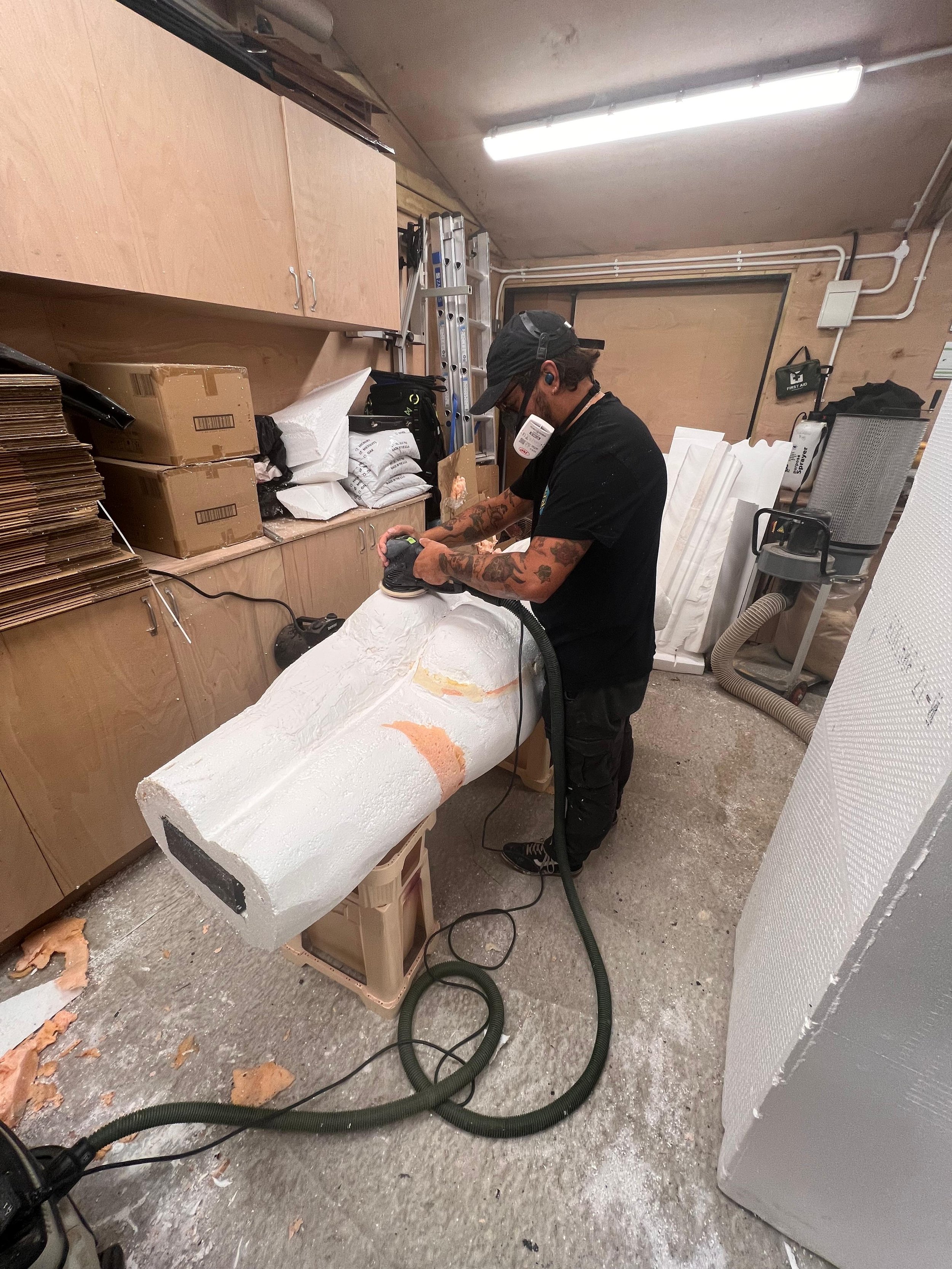  Team Bone hand-carving the bespoke Pegasus sculpture from polystyrene in the Amie Bone studio. 