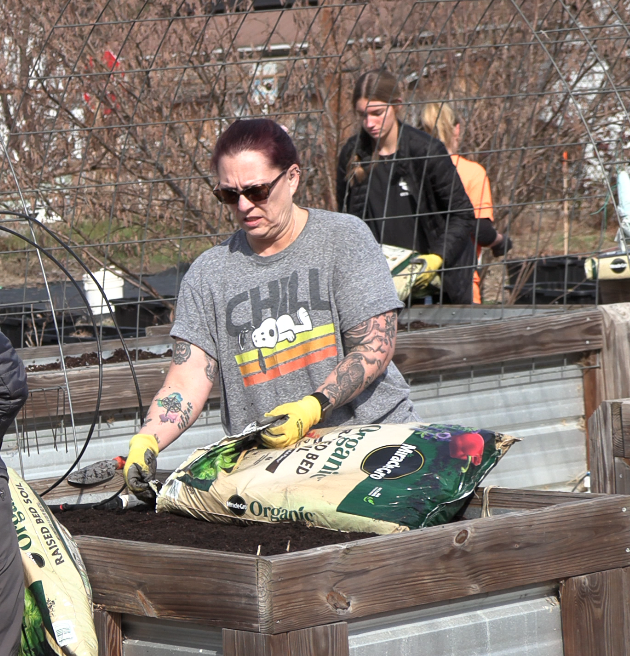 Volunteers Bloom to Prepare Cleo Bailey Experiment Garden for Spring