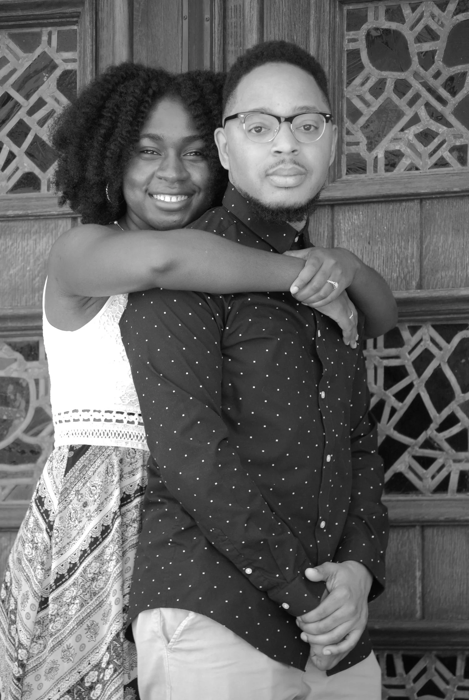 A couple embracing and smiling together