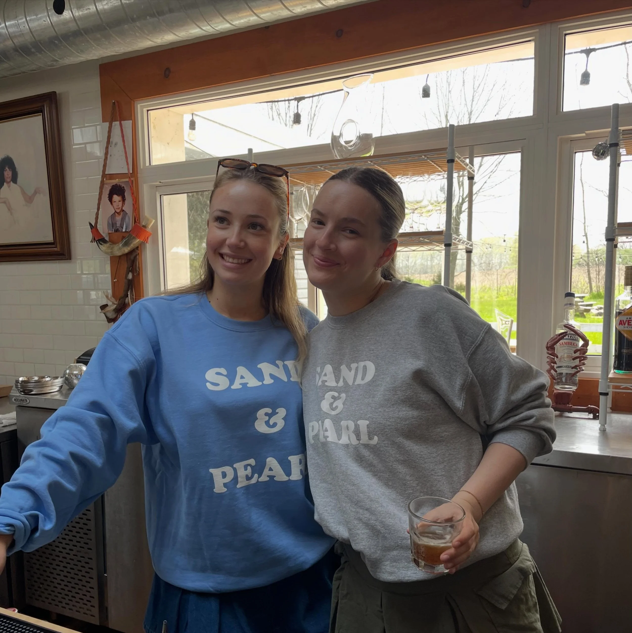 Feels like summer here in West Lake ☀️ 

@reyaparker &amp; @katie_locke_ 
Showing off our new crewnecks 
Come get yours!

Open Victoria Day for lunch 
Sea you soon 

In background @charlie2nuh &amp; @sandrascasa2012
