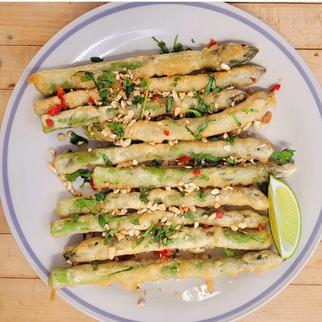 Asparagus from our neighbours @greenridge_farms 

Tempura, nam jam, toasted cashew, cilantro, chili 🌶️