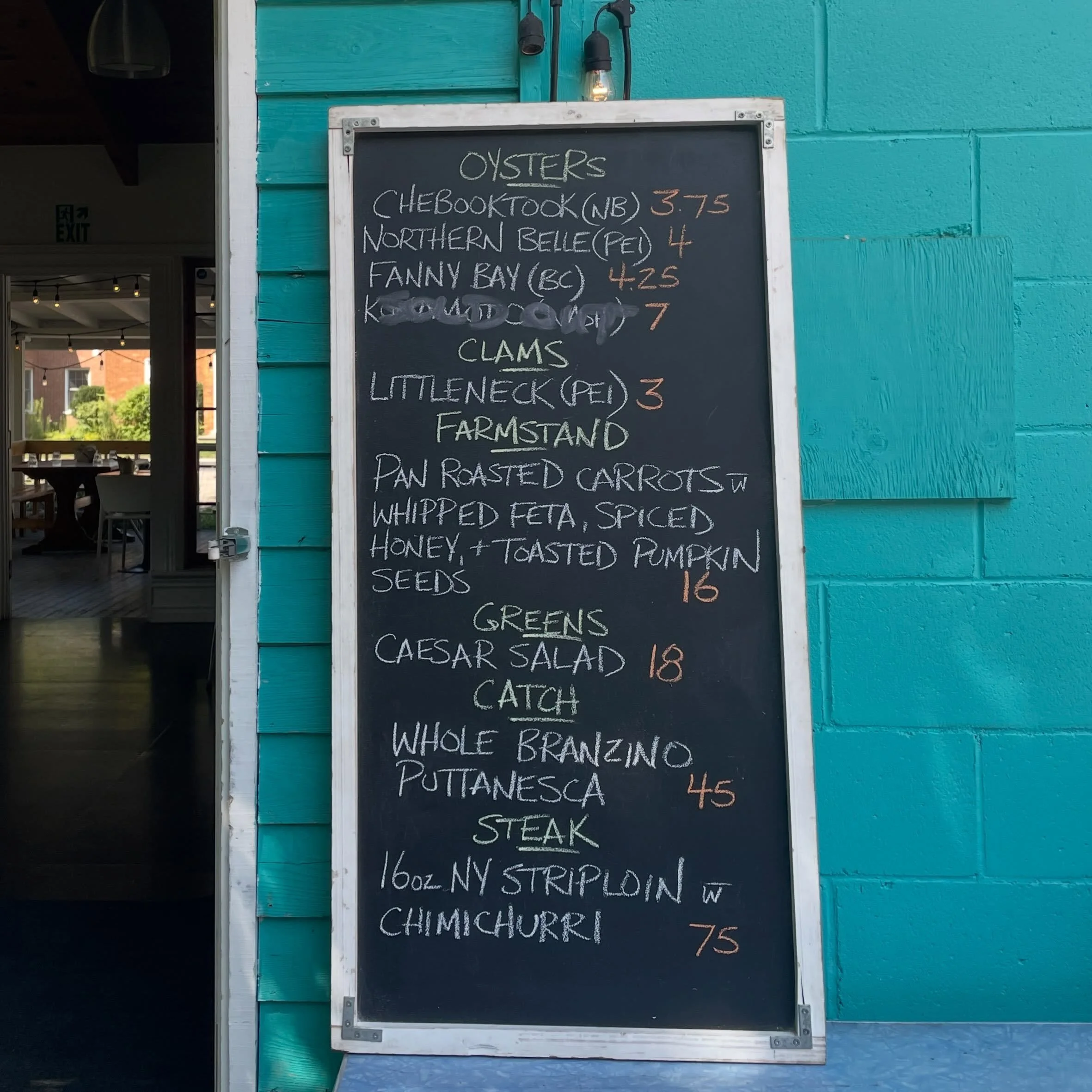 Oysters &amp; Littlenecks, Carrots &amp; Branzino, NY Strip loins and our Caesar Salad

The Feature Board