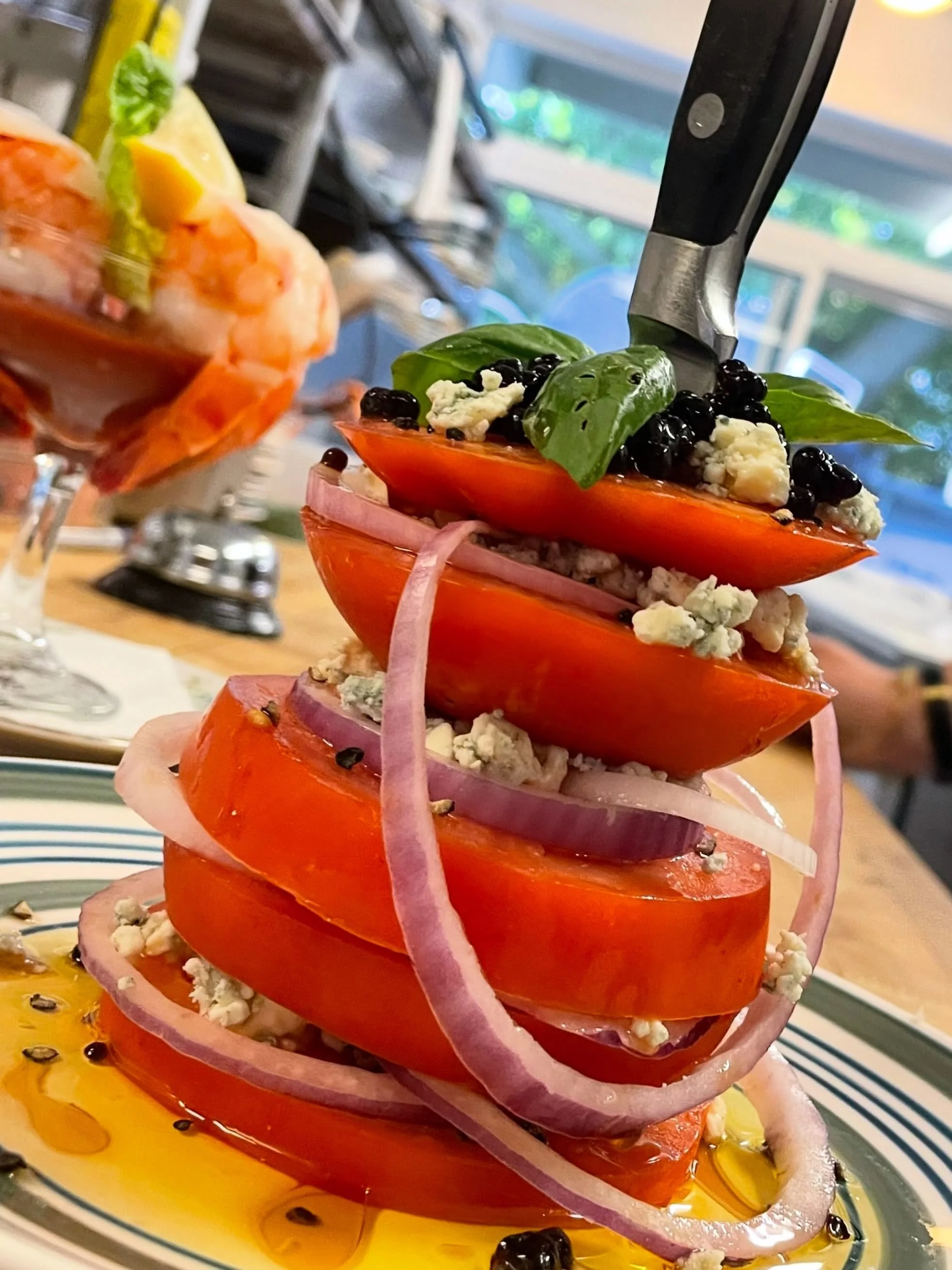 Tomato Tower
Prince Edward County tomato 🍅 + red onion + blue cheese + basil + balsamic pearls