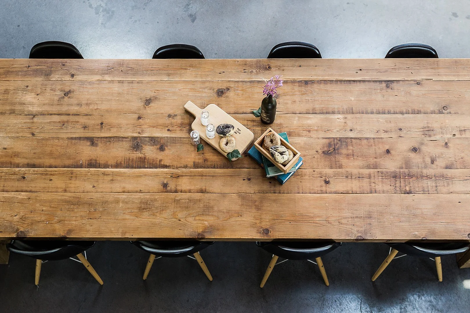 rustic-wood-table-top-view-with-black-eiffel-chairs.jpg