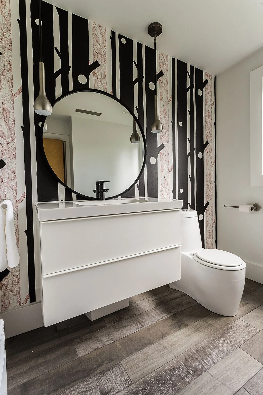 bathroom-with-branch-wallpaper-and-floating-vanity.jpg