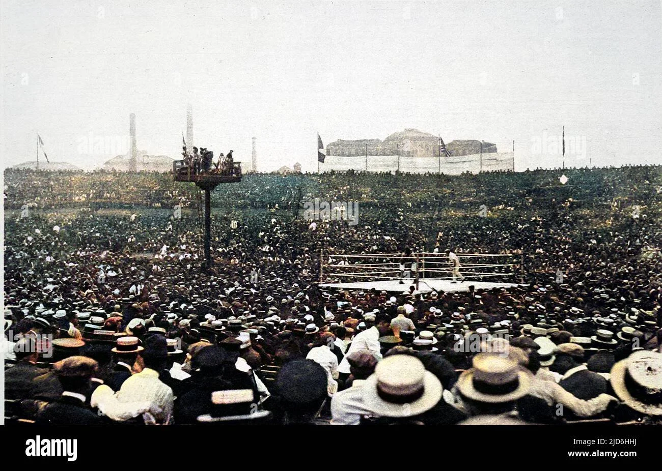 100000-strong-crowd-at-the-fight-between-georges-carpentier-and-jack-dempsey-for-the-heavyweight-championship-of-the-world-held-at-jersey-city-usa-on-2nd-july-1921-colourised-version-of-10220097-date-1921-2JD6HHJ (2).jpg