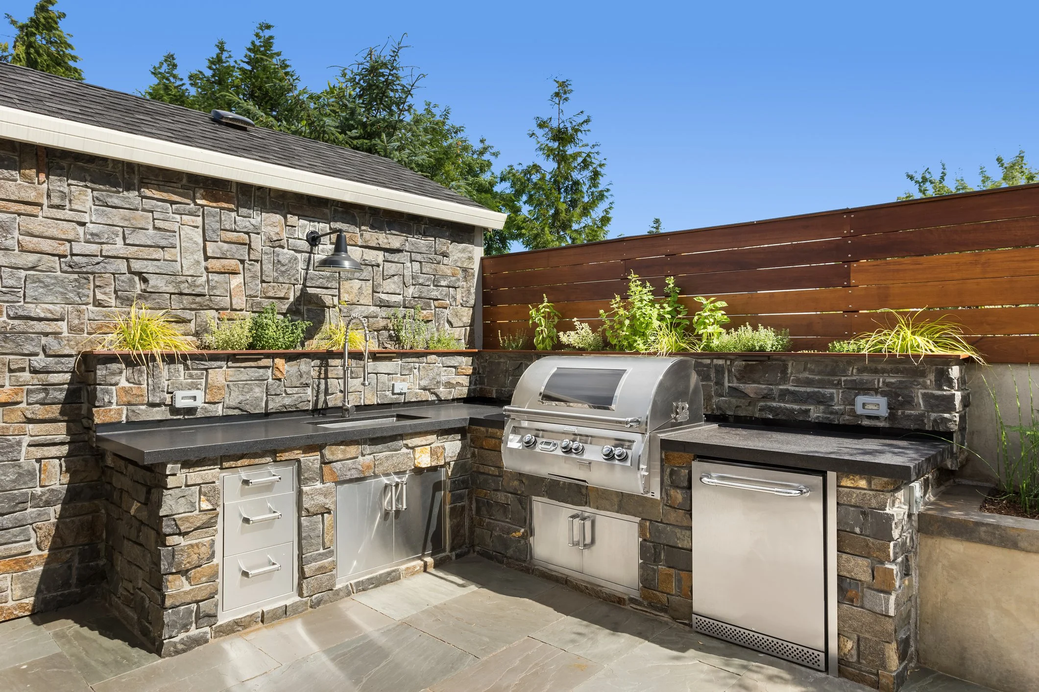 Backyard outdoor kitchen installation in Waxhaw North Carolina for entertaining