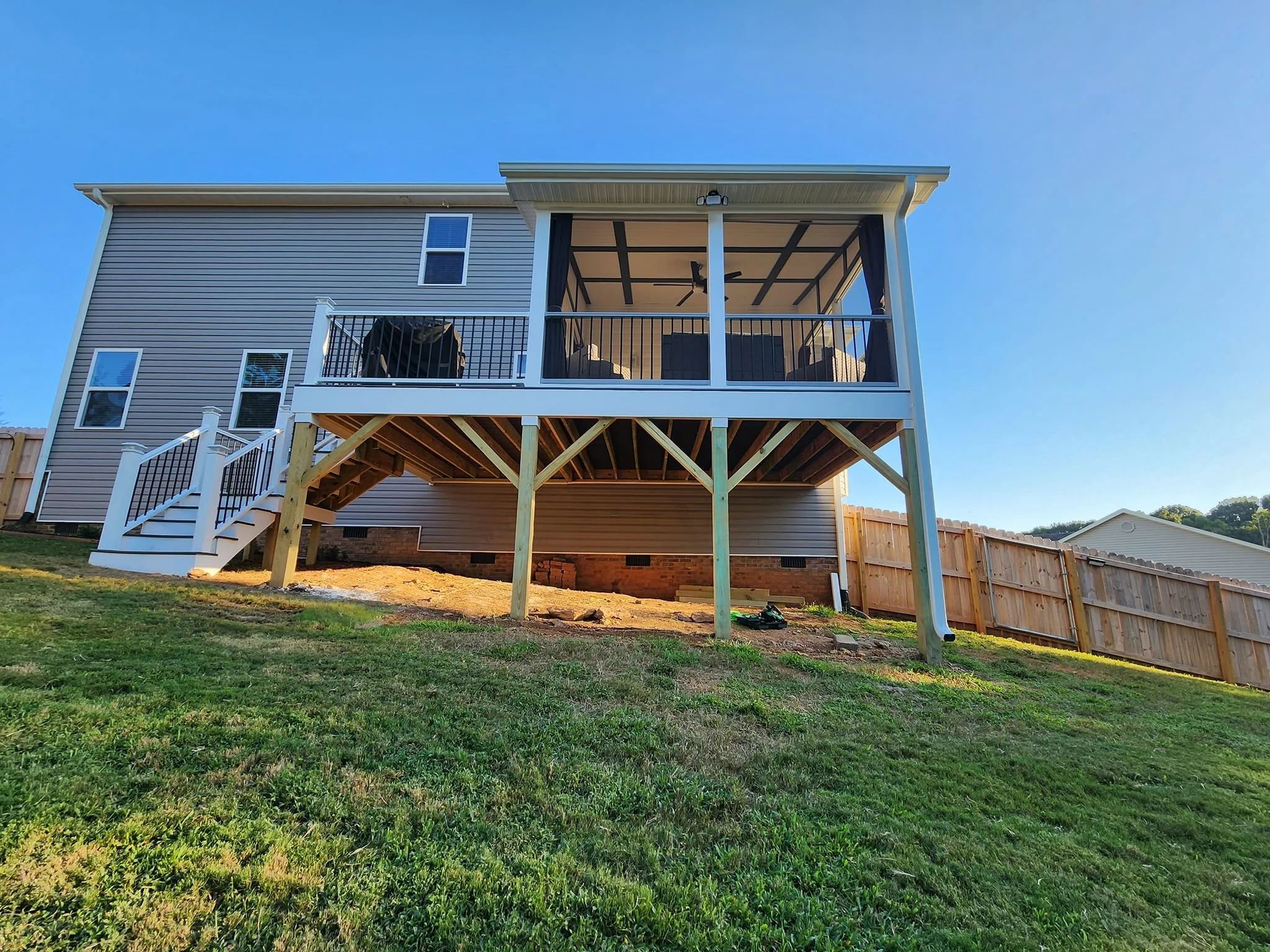 Elevated backyard deck construction in Waxhaw NC by a professional deck contractor