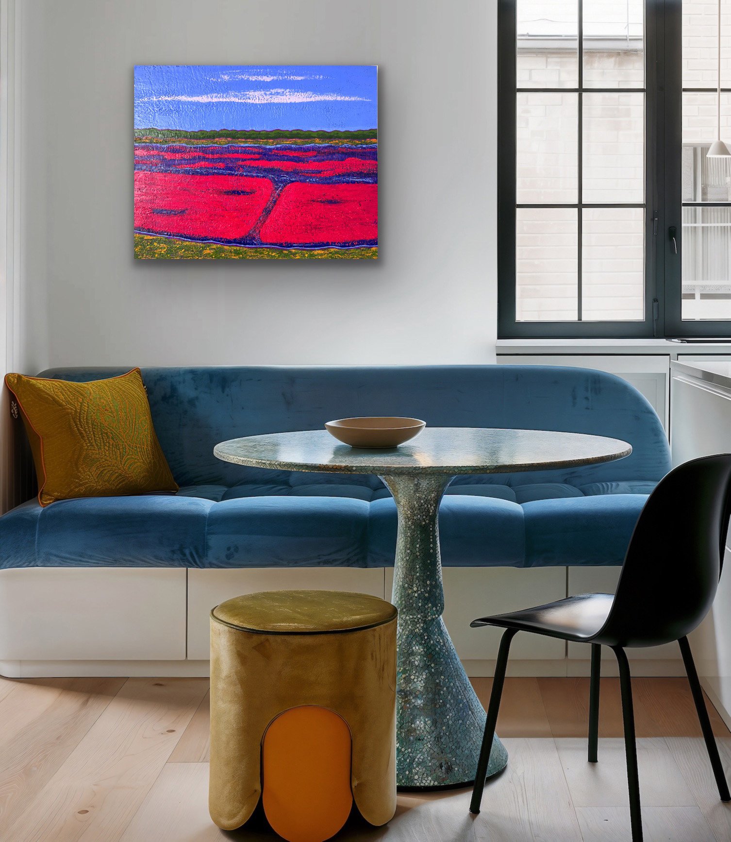 colorful autumn cranberry bog painting hanging in a dining room. The brilliant reds pop against the wall.