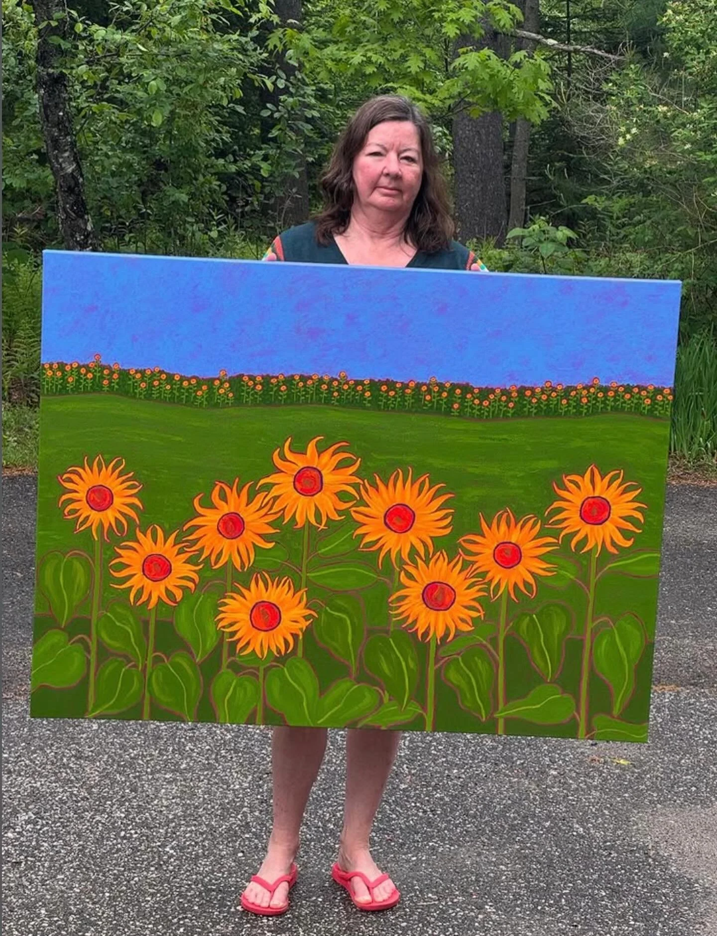 And here&rsquo;s my #1 most popular post from 2025 - me, holding my recently-completed painting Sunflower Farm, 36&rdquo; x 48&rdquo;. You won&rsquo;t see me in flip flops and shorts for a bit, but it is nice to have a reminder that summer will event