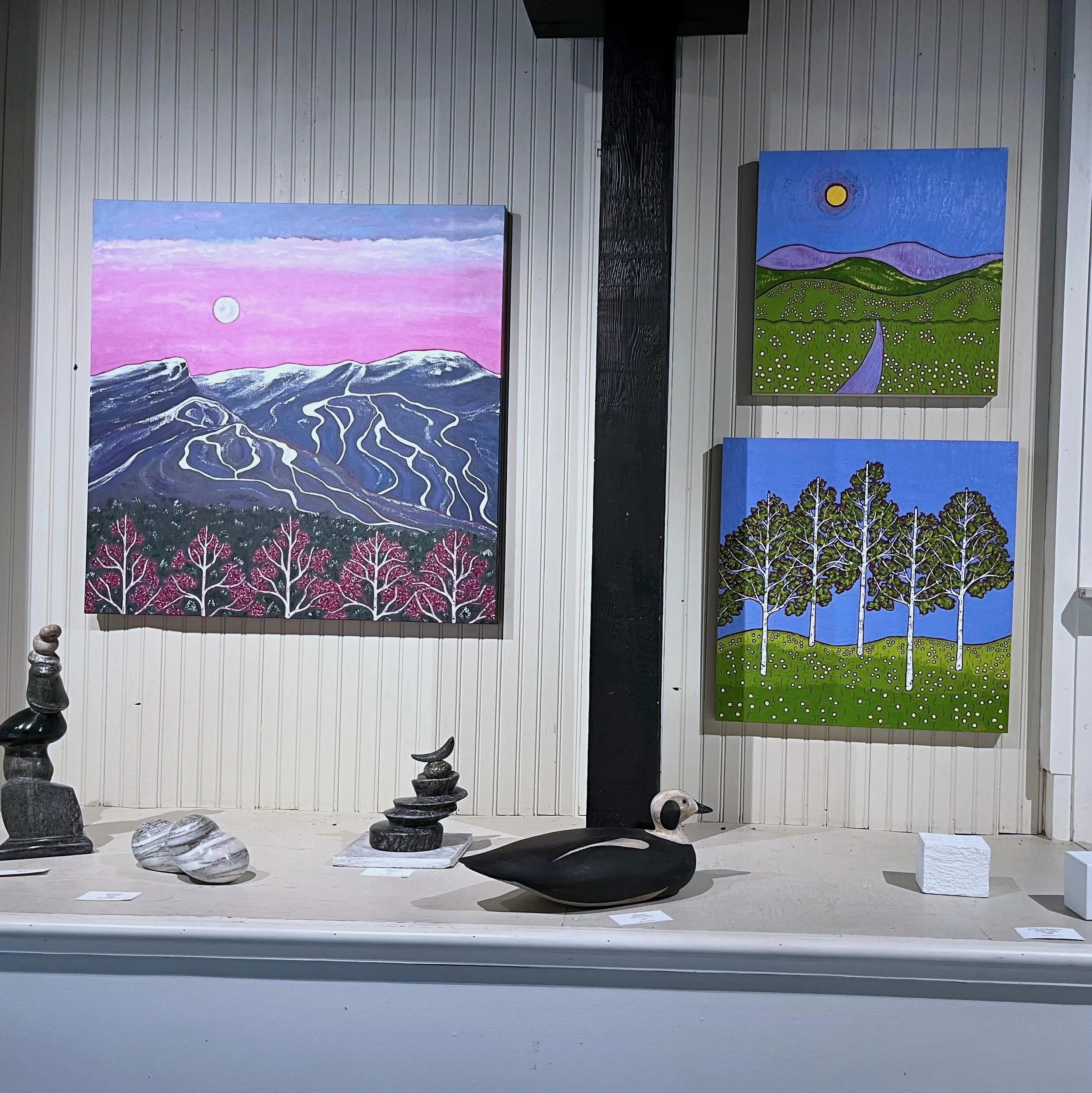 friend was vacationing in Vermont and stopped by @edgewatergalleryvt  She sent along this photo of a grouping of three of my paintings currently on display there. I love thhat they have my winter moonrise Mr Mansfield painting on display. It&rsquo;s 