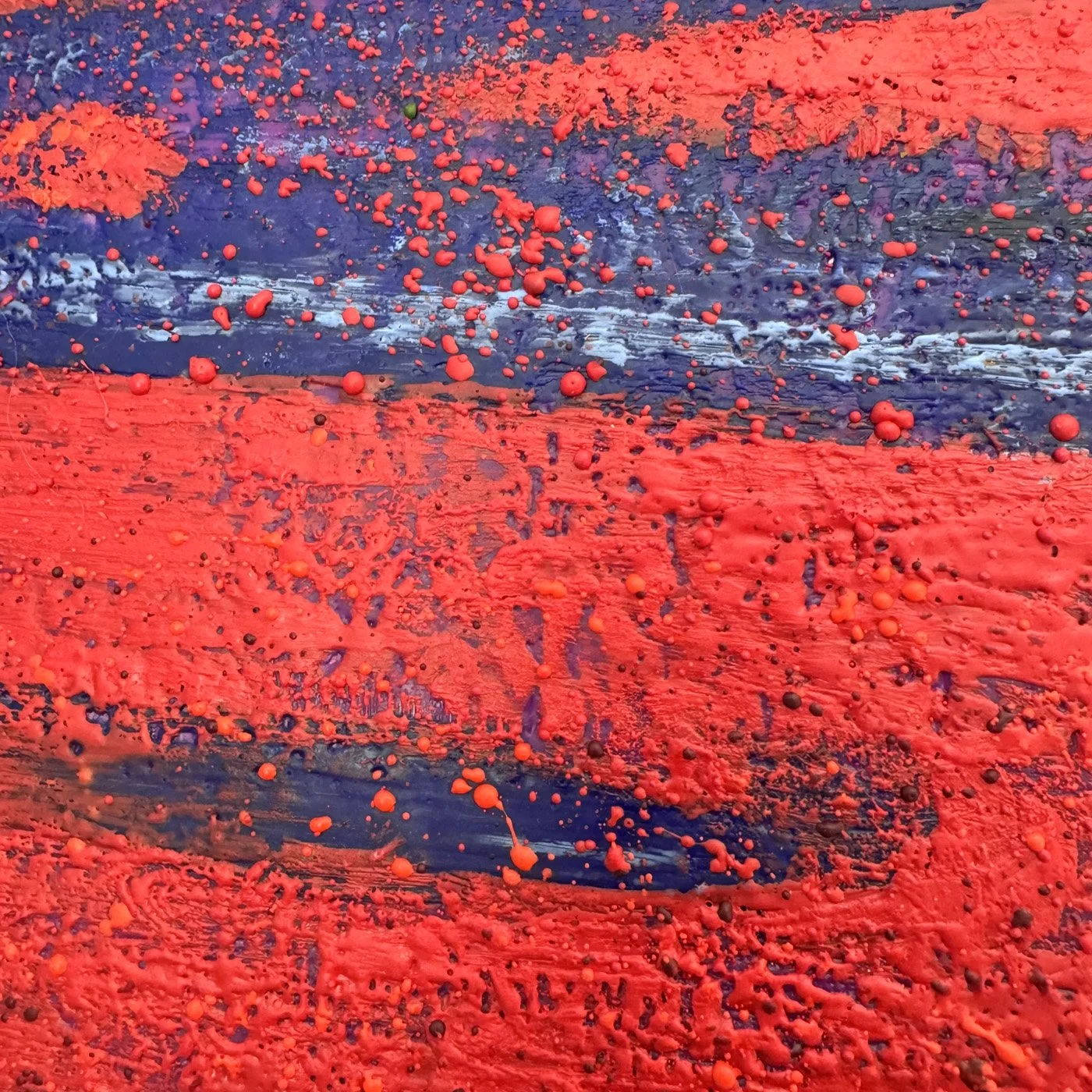 Closeup view of the splattered red was that gives extra texture and depth to this cranberry bog painting.