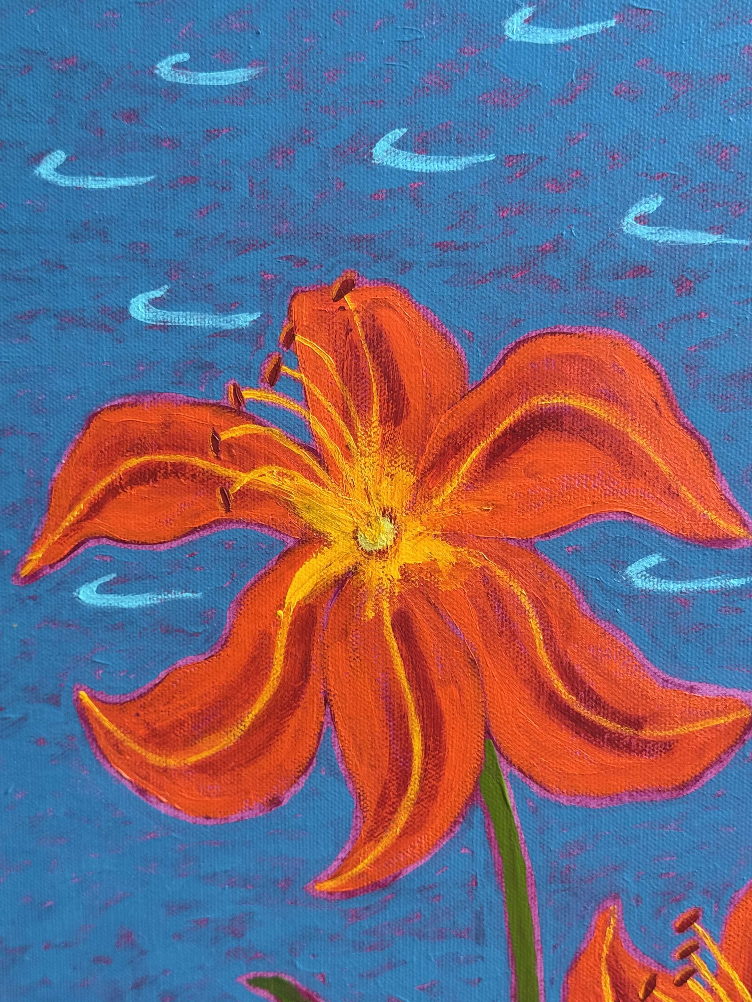 Closeup of orange day lily byt the side of a lake.