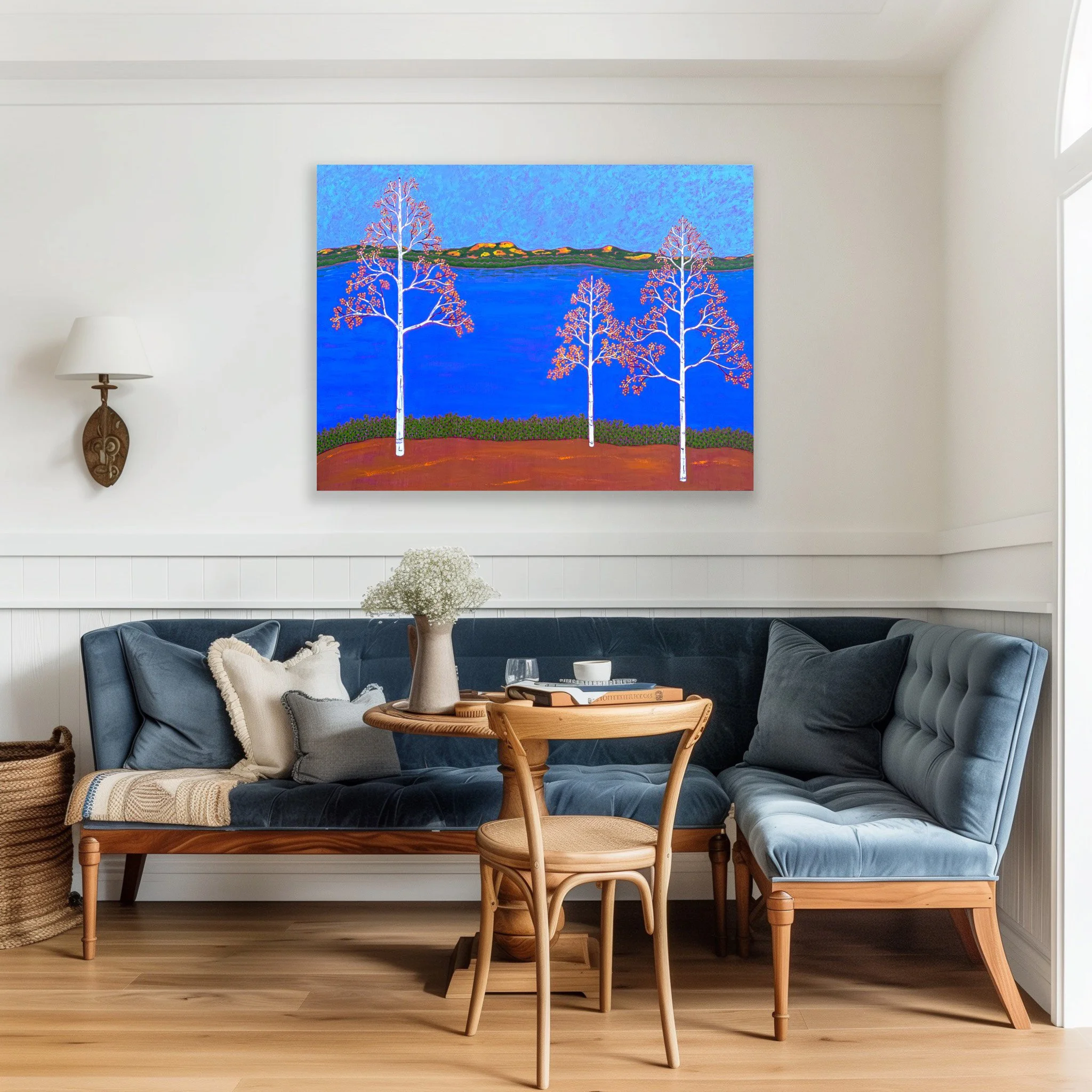 Golden birch tree painting shown how it would add joy to a dining nook.
