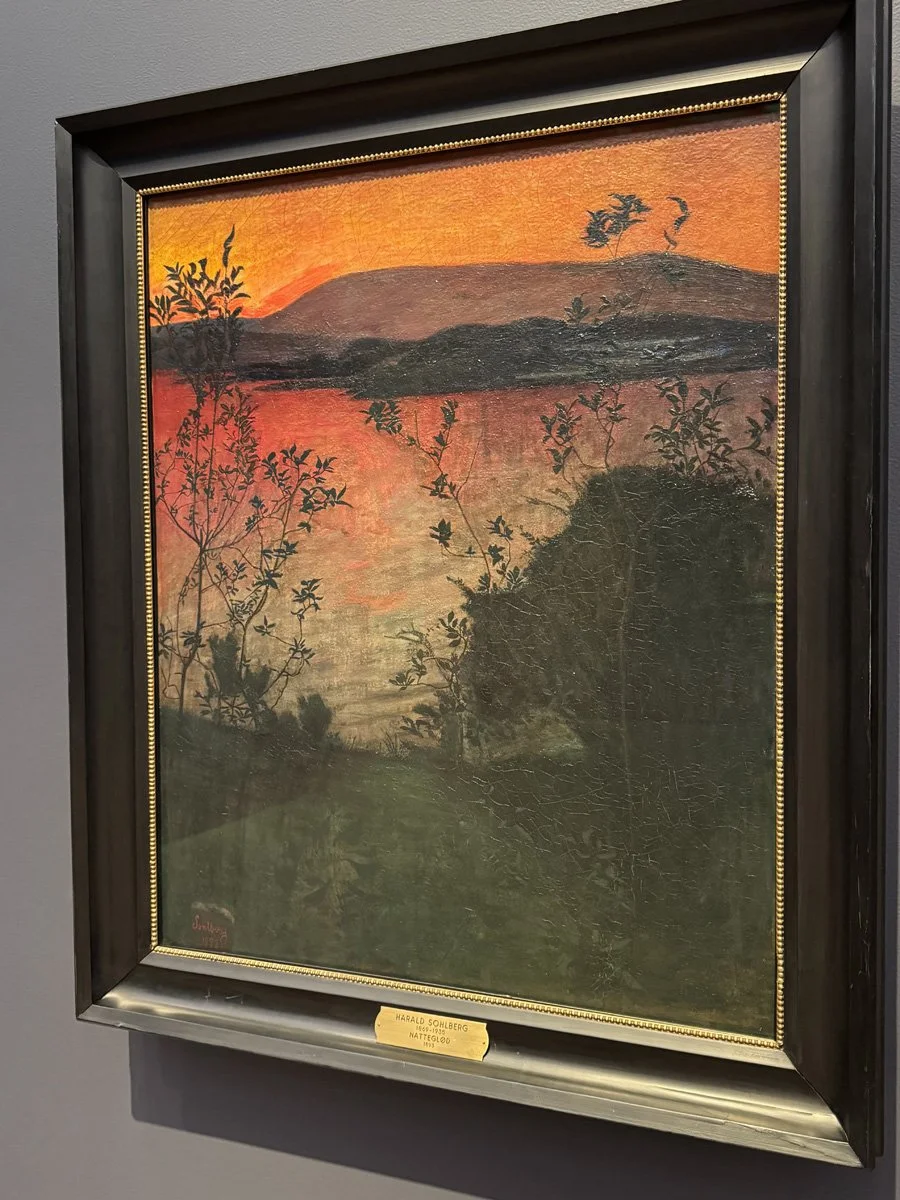 Sohlberg painting of the soft pinks, reds, and oranges of the dying light of the setting sun in Norway.