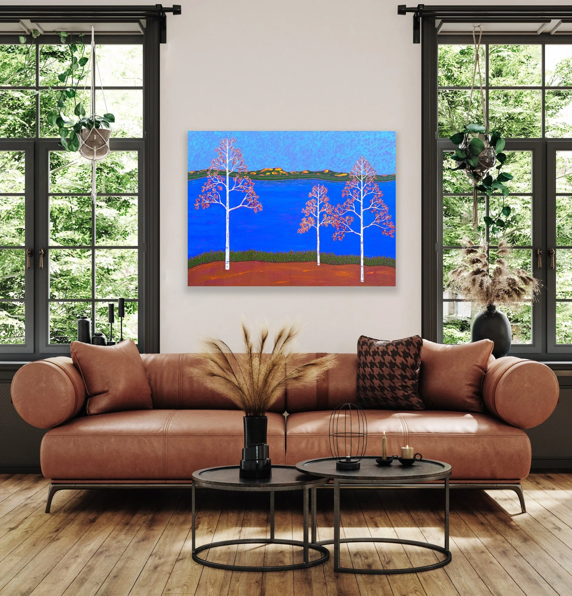 The vivid colors of this autumn birch tree painting liven up a living room.