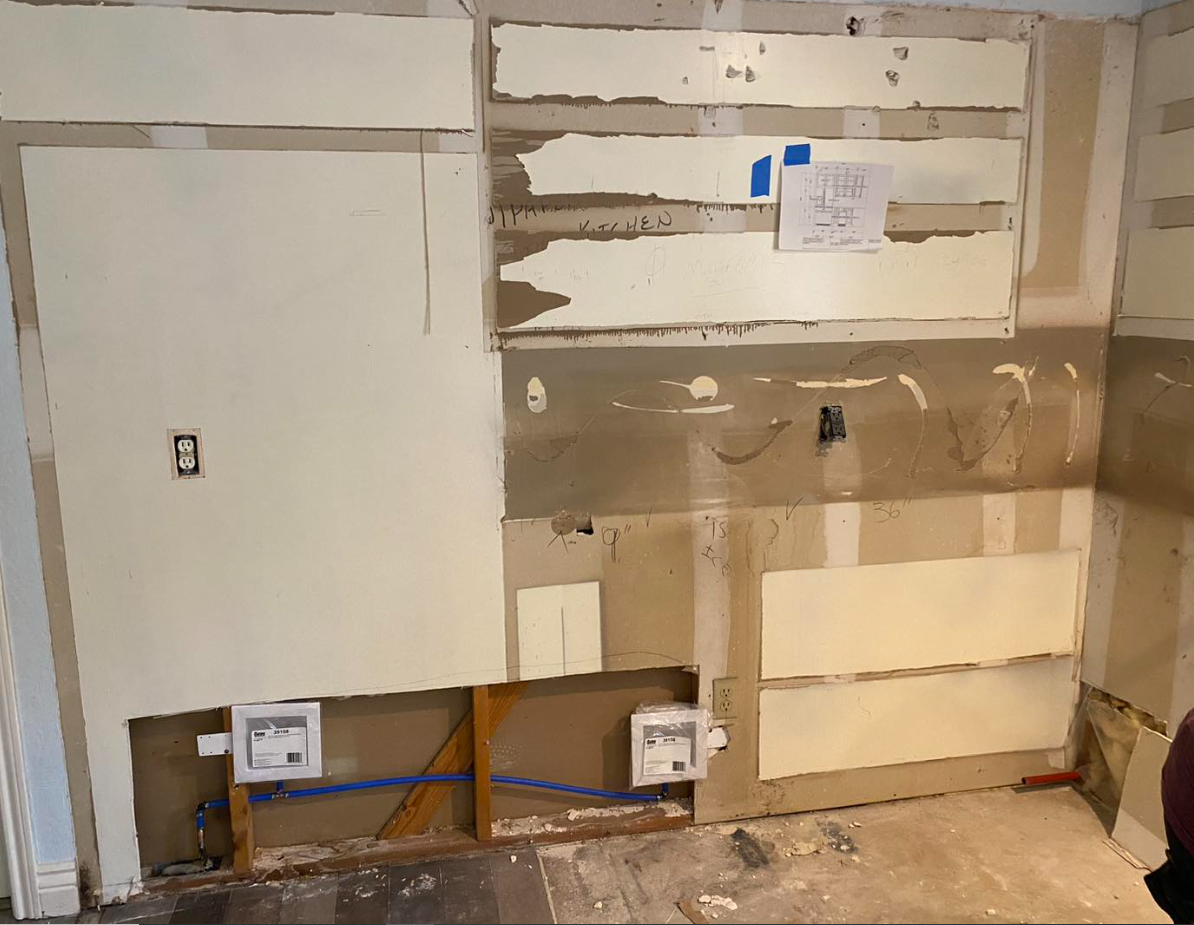 Full color image of construction - new kitchen in progress.