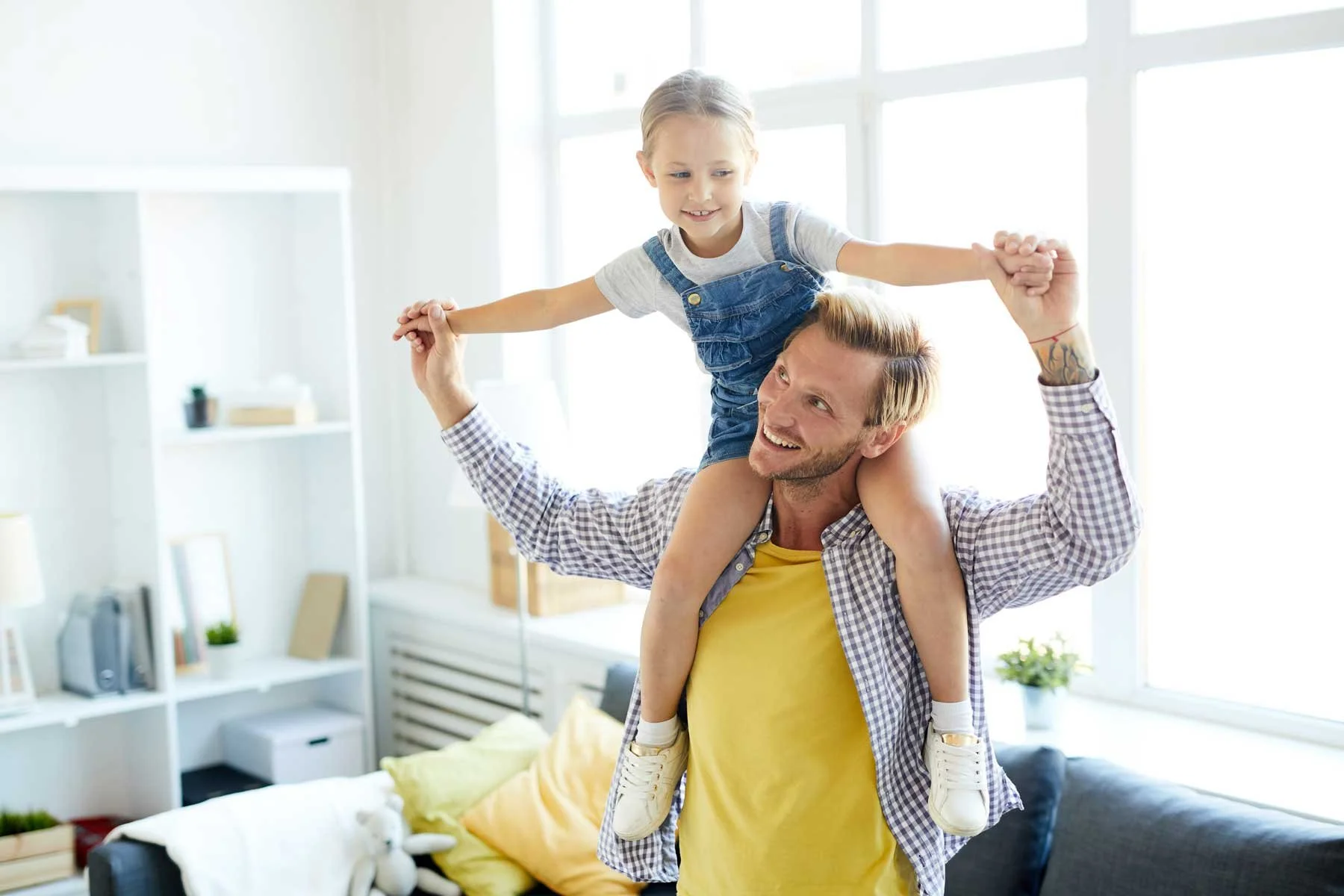 Happy family relaxing in their warm home, enjoying reliable heating from a Carrier boiler system