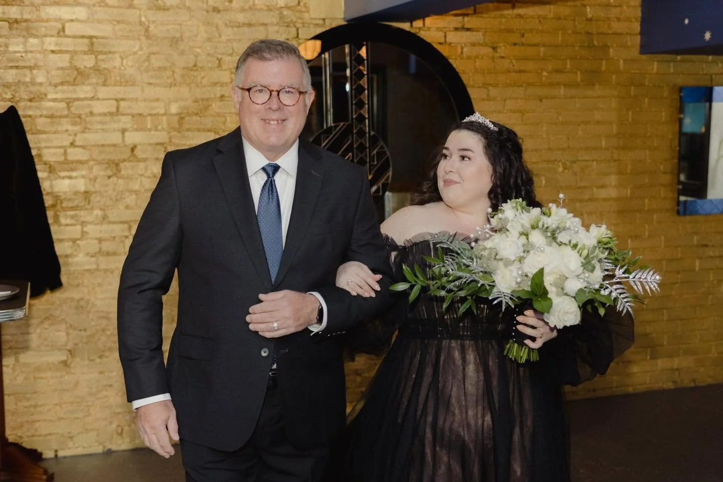 Image of a young woman and her father at a private event held at The Fountain on Locust event venue