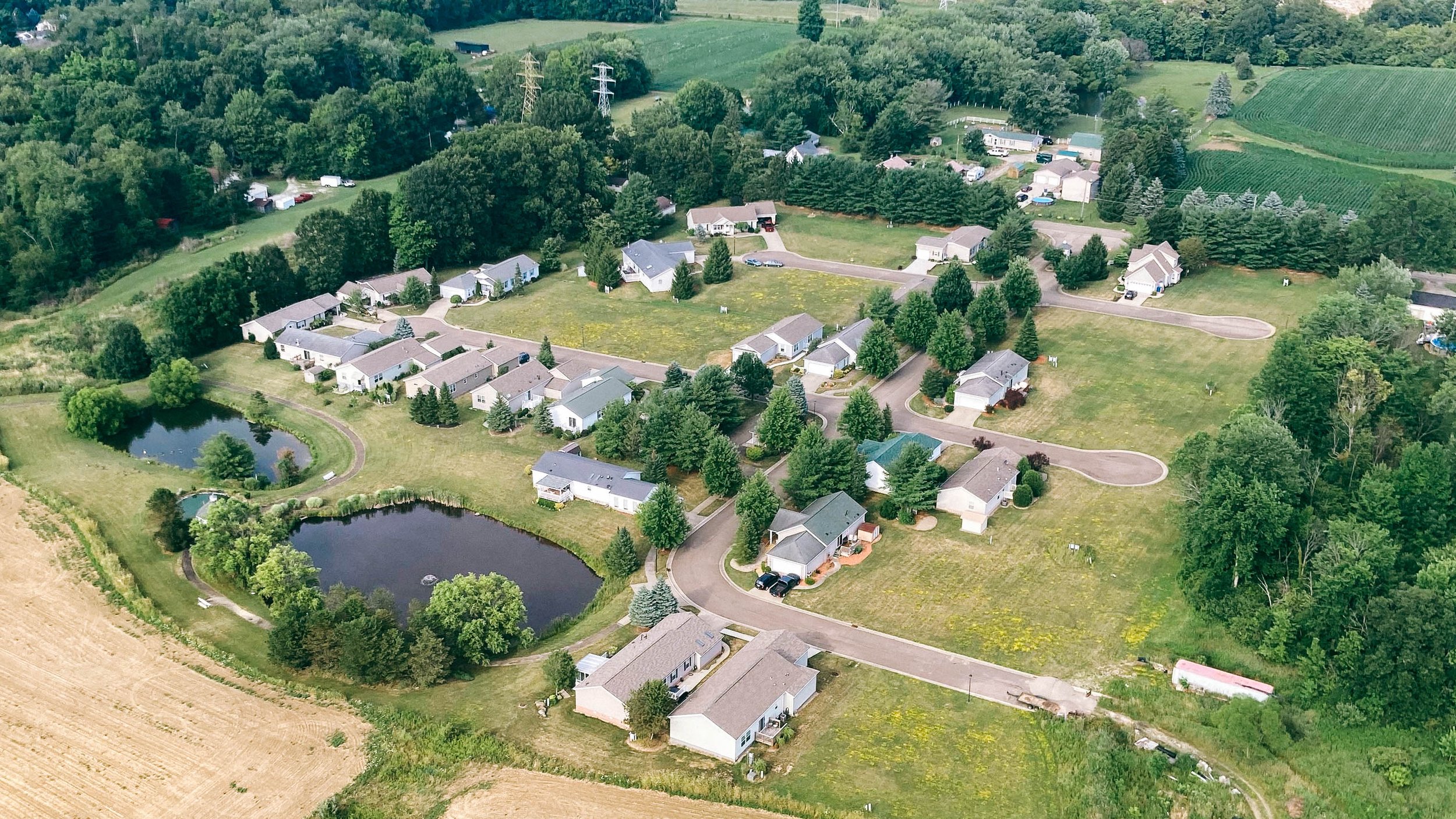 Developments with meaning. Our projects are dedicated to enhancing the lives of our community members. As manufactured home developers, our commitment is to provide custom quality homes at wholesale prices to the families who need it most.