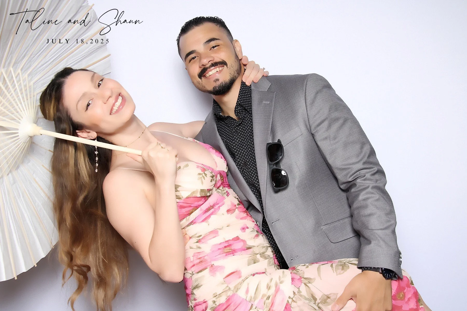 Guests using colorful Halo Photo Booth