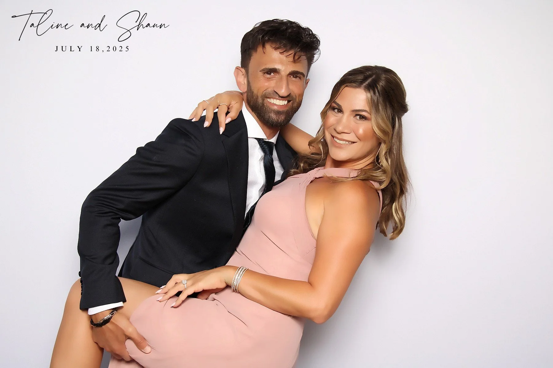 Guests using colorful Halo Photo Booth