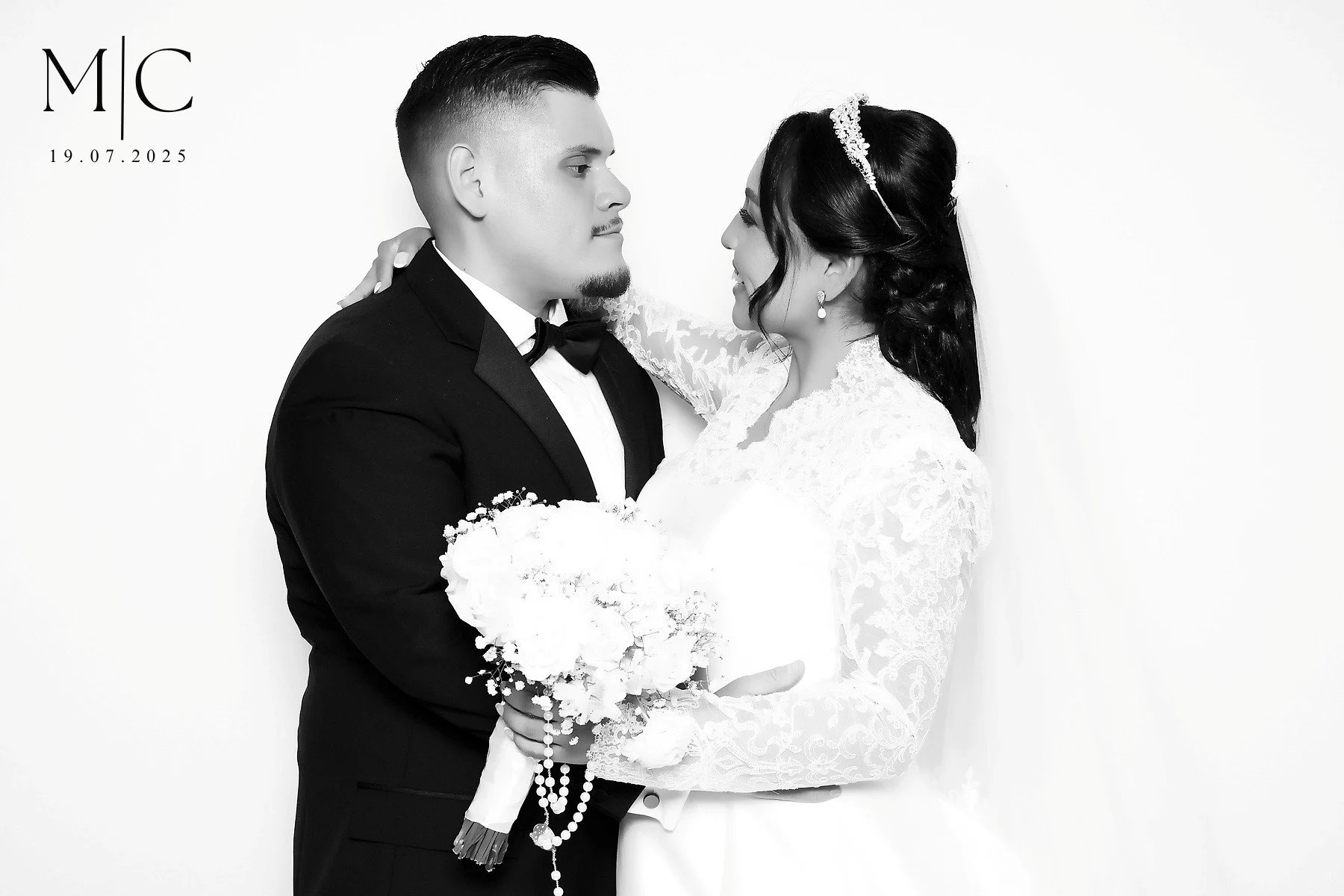 Black & white glam booth photo from a luxury wedding.