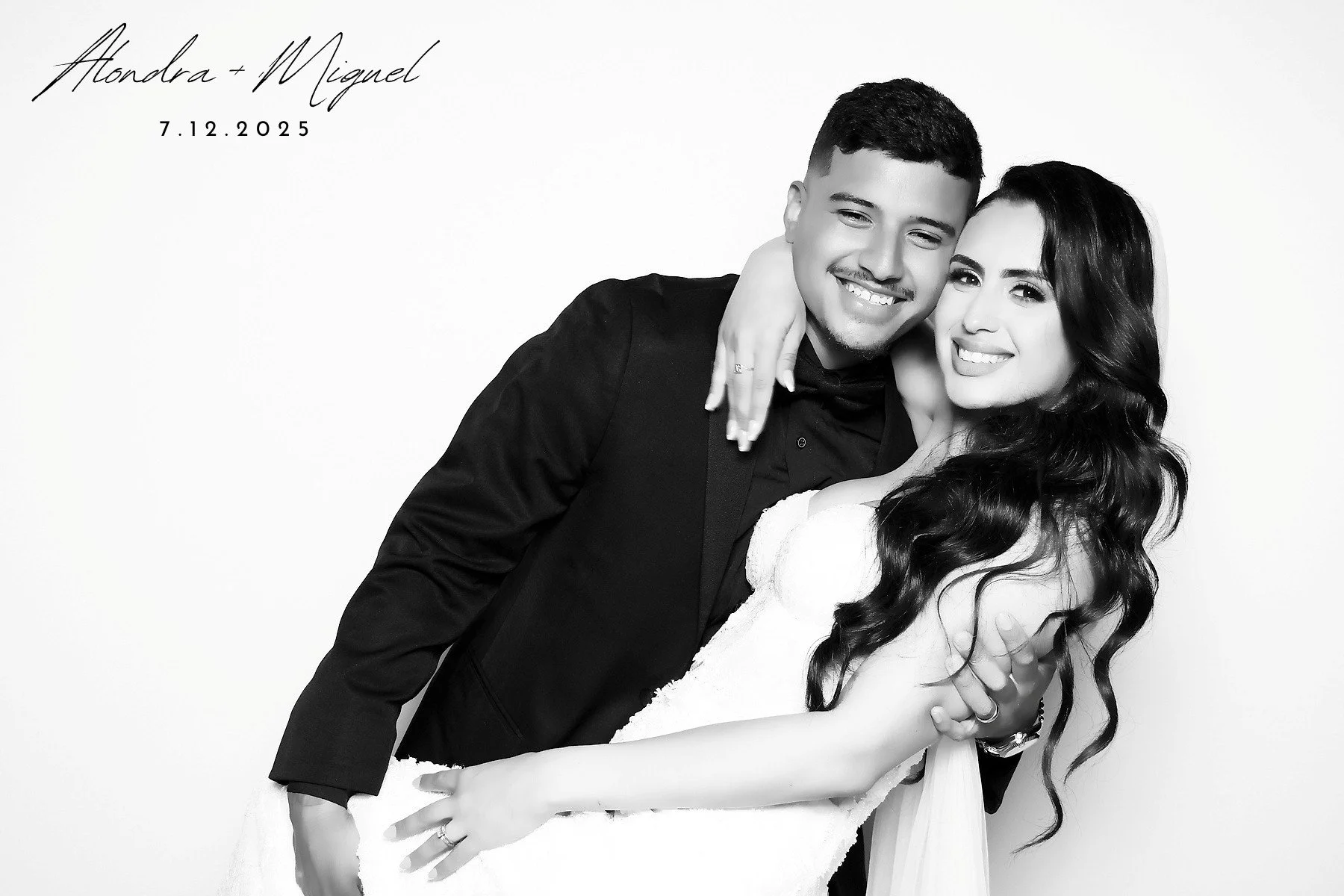 Black & white glam booth photo from a luxury wedding.