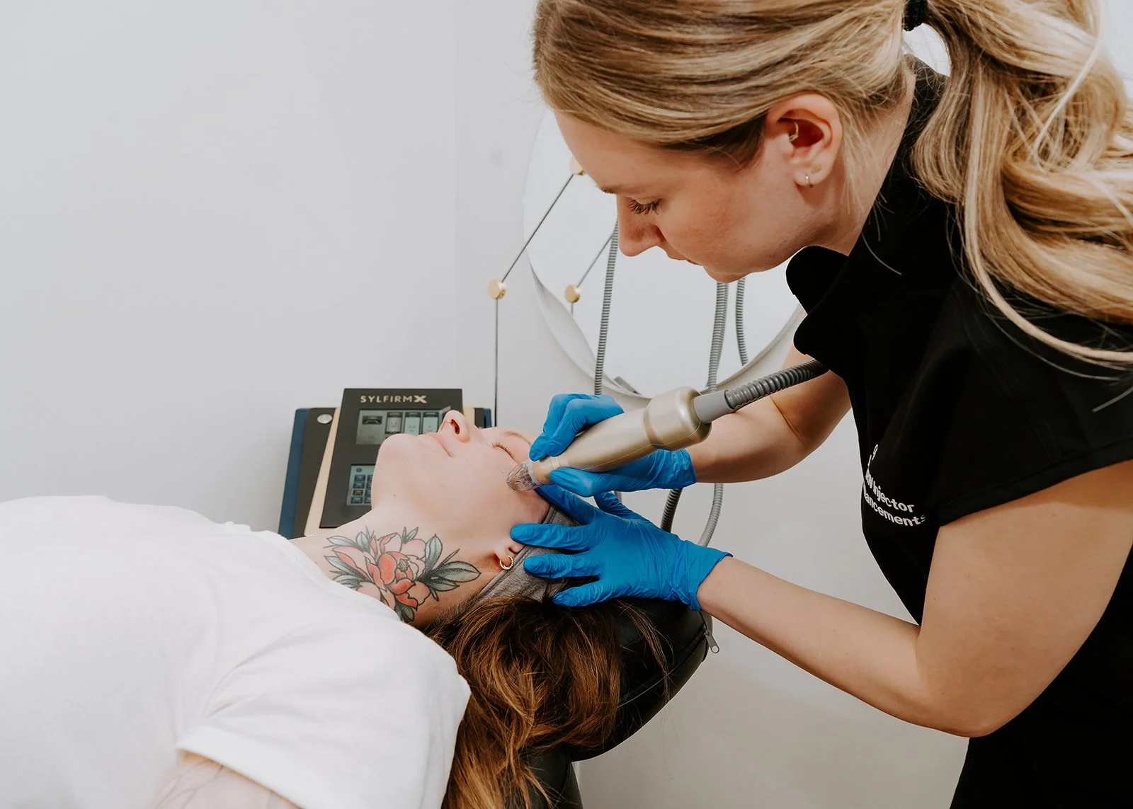 nurse injector performing sylfirm x radio frequency microneedling treatment