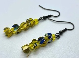 This Saturday!&mdash;Learn how to create earrings and pendants using recycled aluminum cans and glass beads. This is a great way to be earth-friendly, using materials you may already have at home, while creating some lovely wearables. All materials w