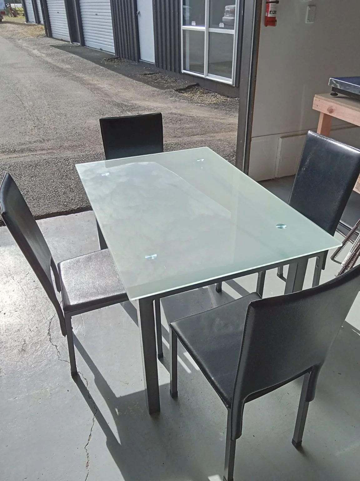 Glass top dining table and 4 chairs.jpg