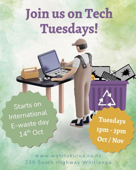 Man at bench fixing computer