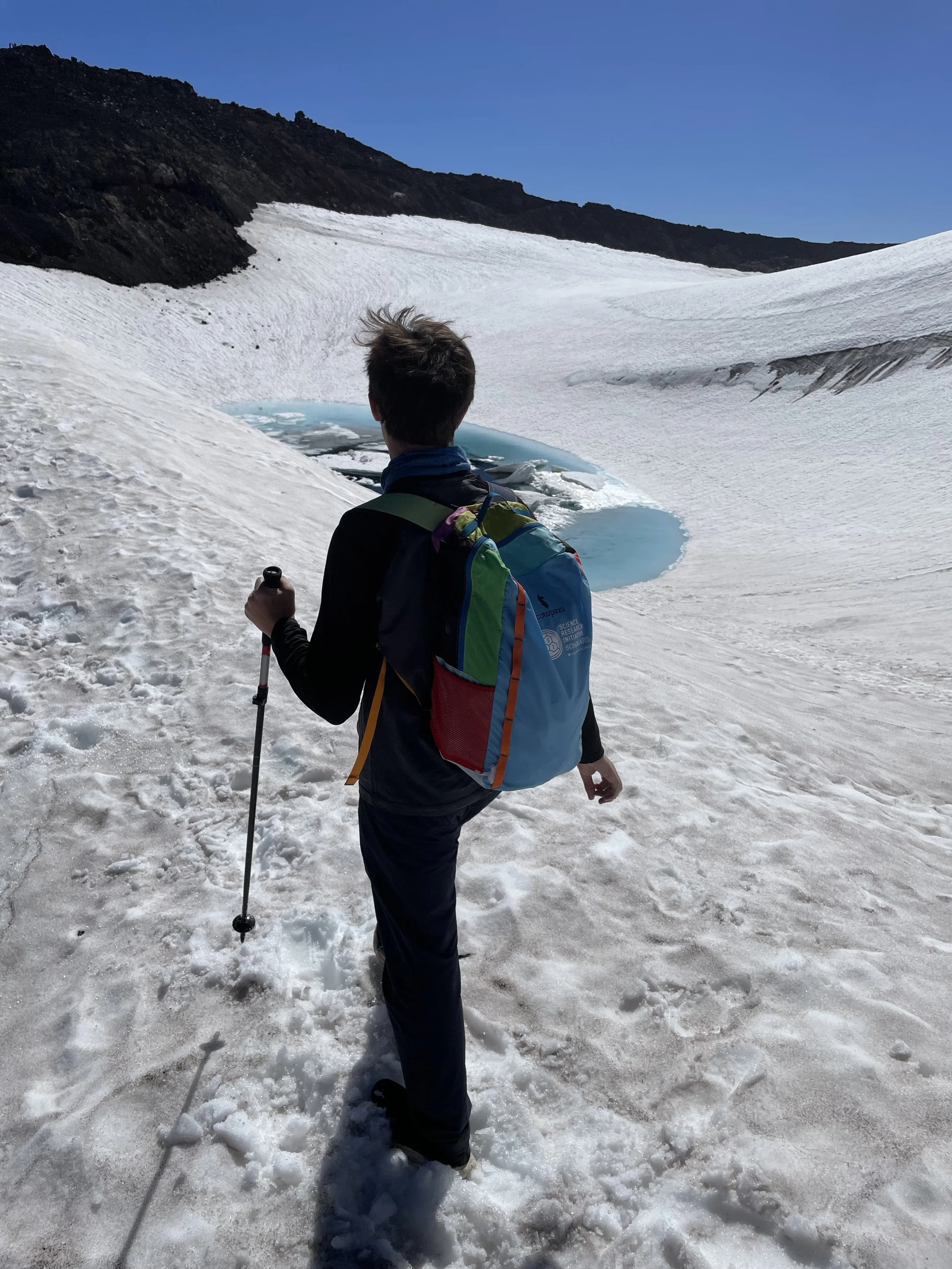 Hudson nearing the summit with Teardrop Lake, the highest lake in Oregon