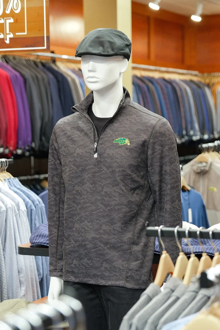 Bison-logo quarter-zip pullover on a mannequin in the store