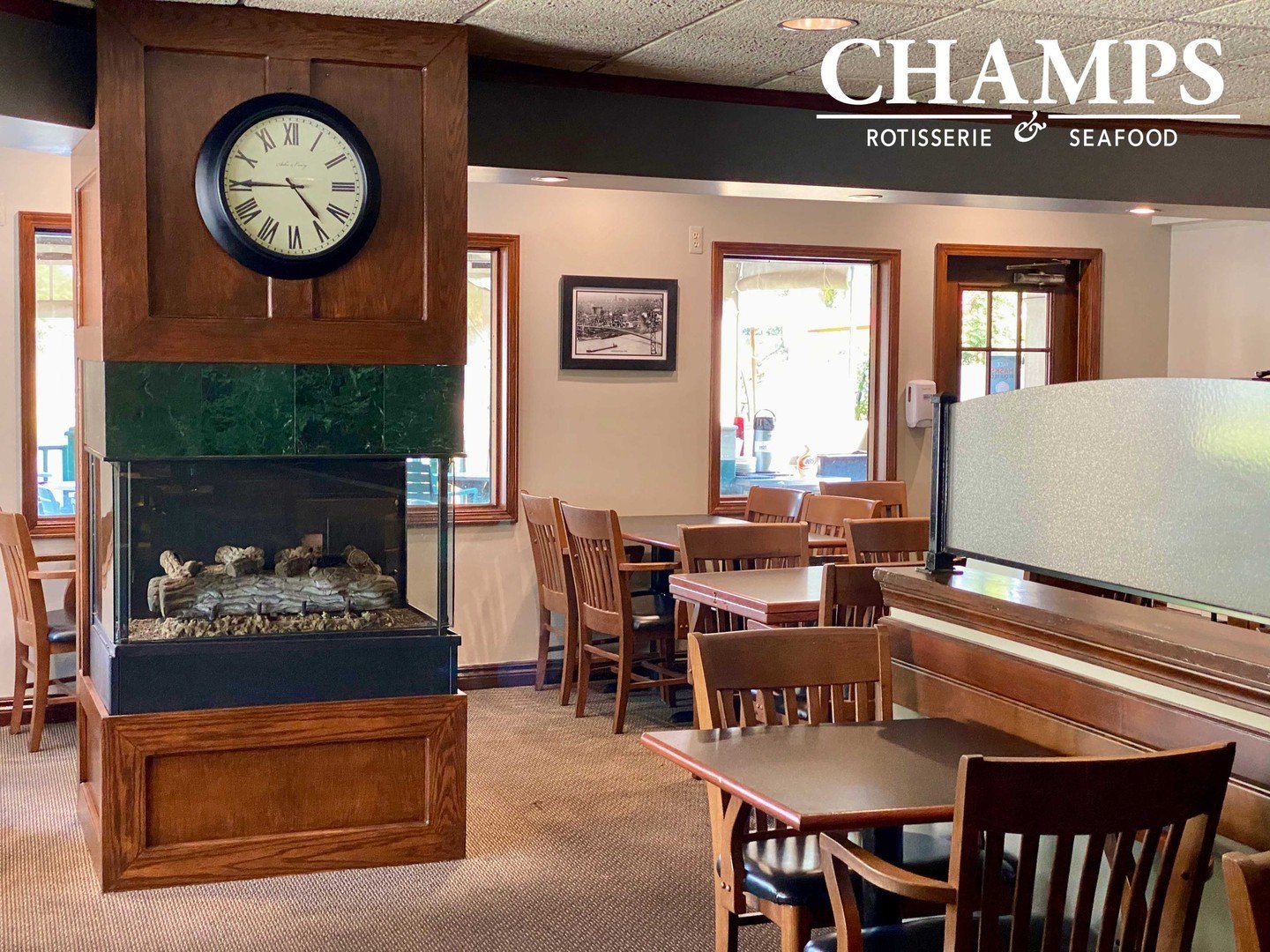 Experience relaxation and comfort at Champs&mdash;unwind fireside.